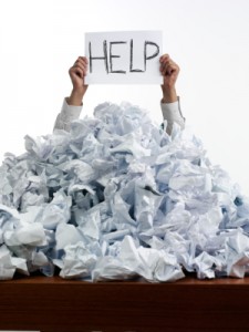 help-in-pile-of-crumbled-paper